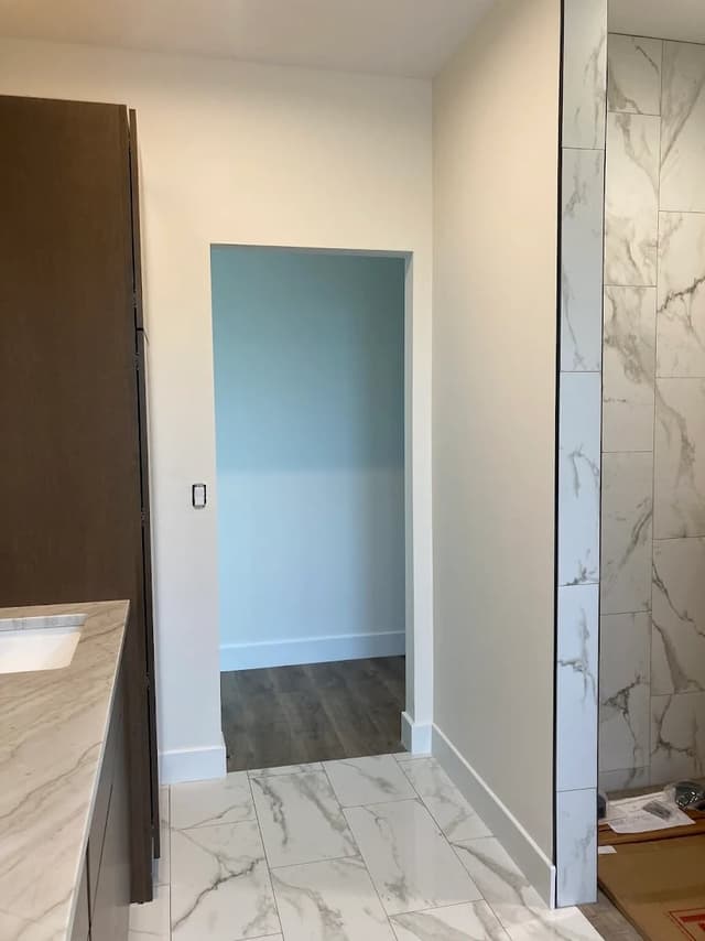 White Chooz Painters logo with blue background placeholder for paintig company logos